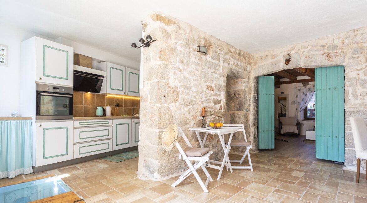 Rustic Kitchen with Stone Archway