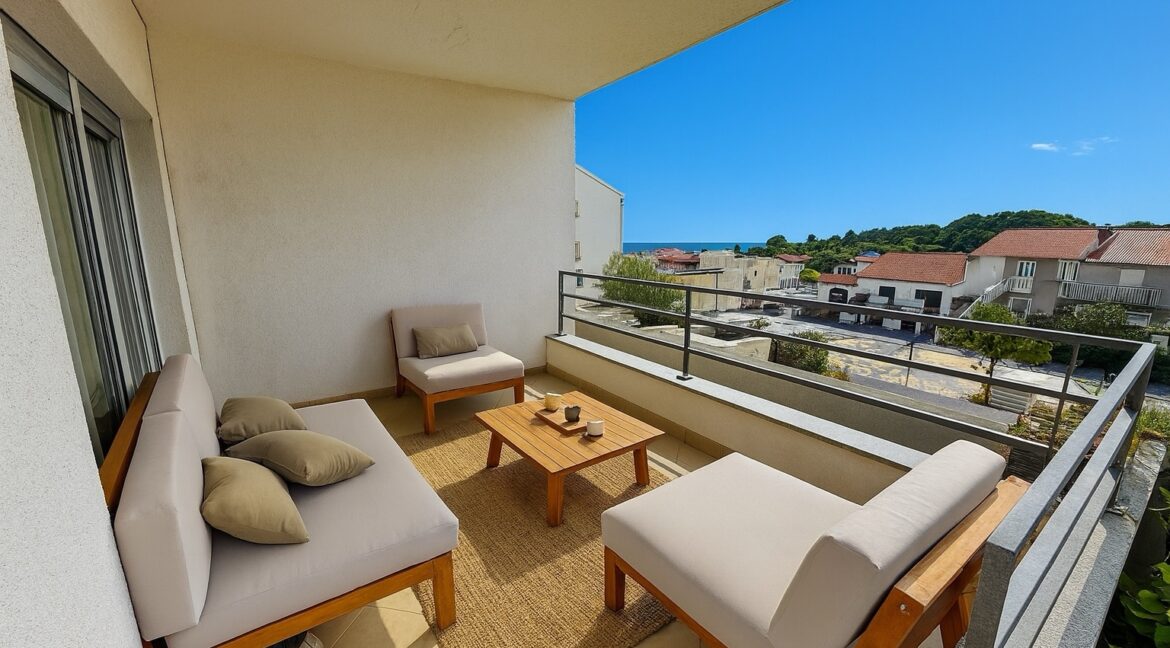 Covered balcony lounge with sea view