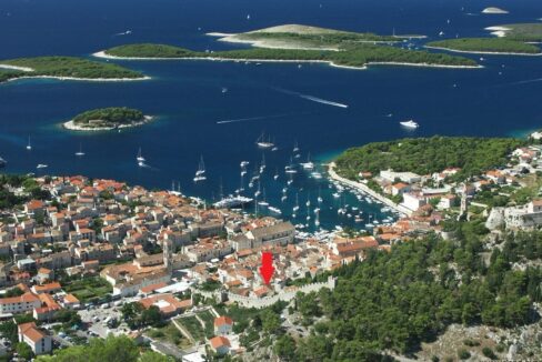 Aerial view of Hvar town and Pakleni islands with apartment location marked