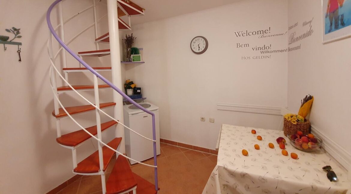 Spiral Staircase and Dining Area